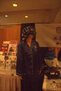 A lady wearing shower cap on her head